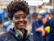 Auto worker poses for a photo